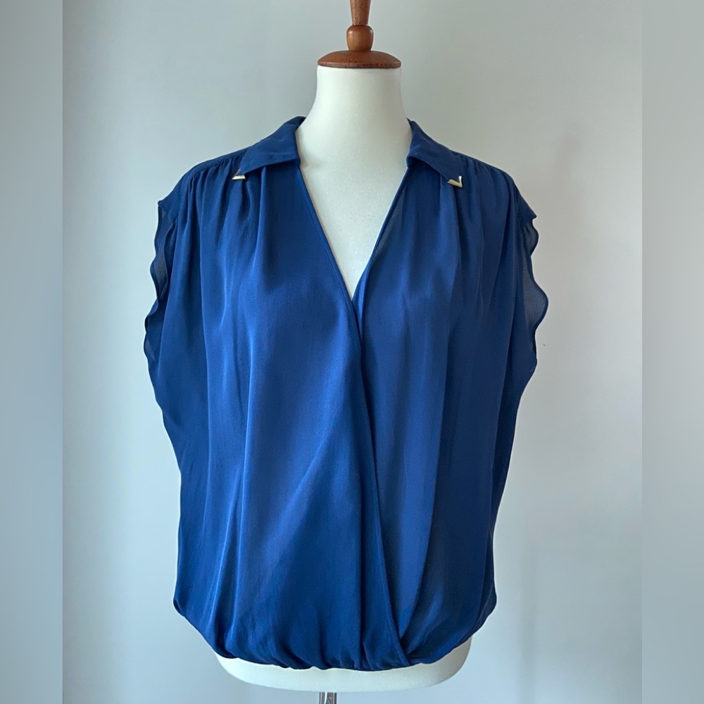 Parker navy blue silk sleeveless cross over blouse.
